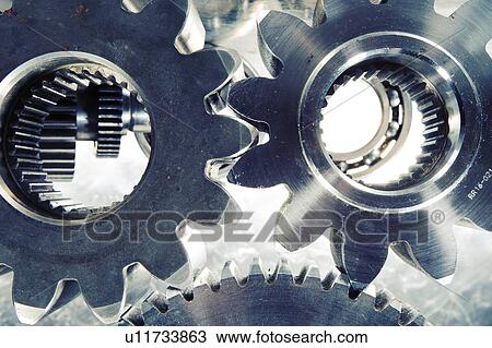 Stock Image - Large gears in action.. Fotosearch