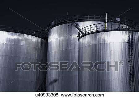 Large industrial fuel storage tanks. View Large Photo Image Stock Photography - Large industrial fuel storage tanks.. Fotosearch