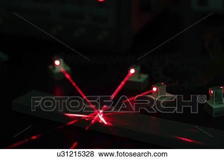 Stock Photo - Laser experiment in photonics laboratory.. Fotosearch