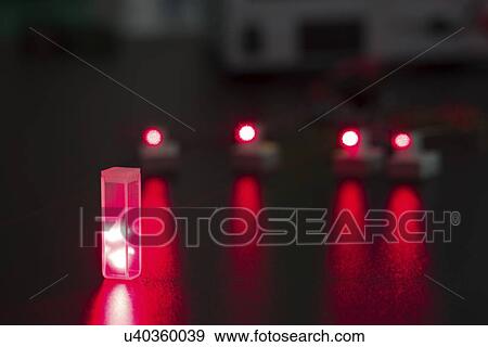 Stock Photo - Laser experiment in photonics laboratory.. Fotosearch