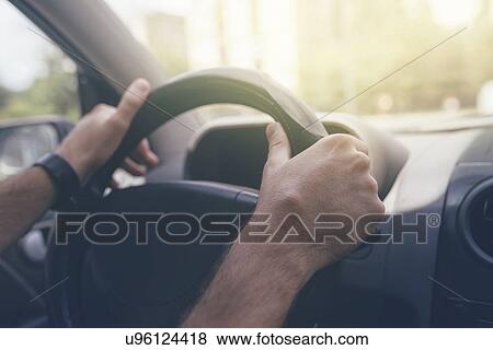 Man driving a car. View Large Photo Image Stock Photo - Man driving a car.. Fotosearch