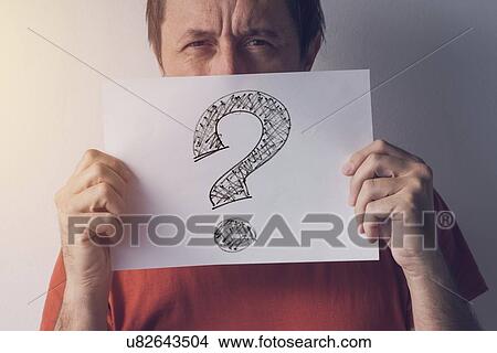 Man looking for answers, conceptual image. View Large Photo Image Picture - Man looking for answers, conceptual image.. Fotosearch