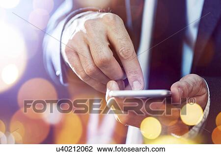 Man using smartphone. View Large Photo Image Stock Image - Man using smartphone.. Fotosearch