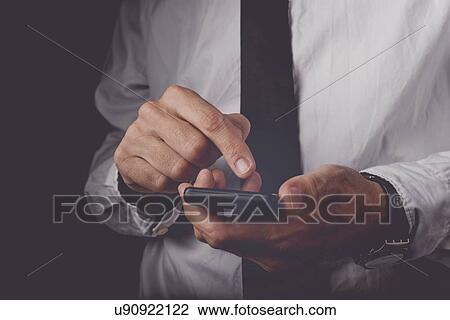 Man using smartphone. View Large Photo Image Stock Image - Man using smartphone.. Fotosearch
