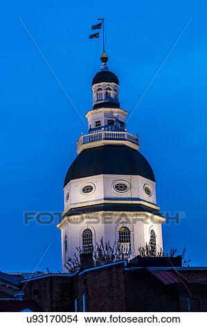 Picture - Maryland State Capitol is seen at dusk above Main Street Annapolis, Maryland. Fotosearch