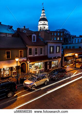 Stock Photography - Maryland State Capitol is seen at dusk above Main Street Annapolis, Maryland. Fotosearch