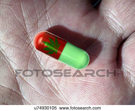 Medicinal marijuana capsule on hand palm. View Large Photo Image Stock Photography - Medicinal marijuana capsule on hand palm.. Fotosearch