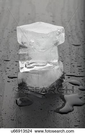 Melting ice cubes. View Large Photo Image Picture - Melting ice cubes.. Fotosearch