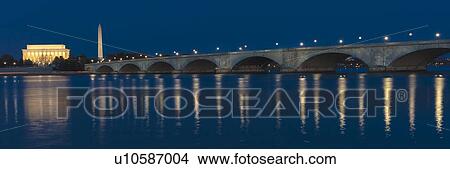 Memorial Bridge at dusk blue-hour spans Potomac River and features Lincoln Memorial and Washington Monument View Large Photo Image Picture - Memorial Bridge at dusk blue-hour spans Potomac River and features Lincoln Memorial and Washington Monument. Fotosearch
