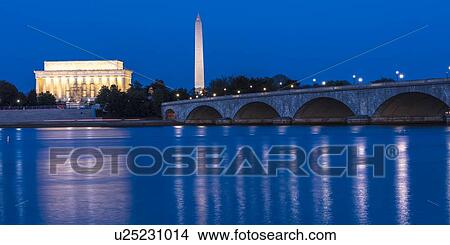 Memorial Bridge at dusk blue-hour spans Potomac River and features Lincoln Memorial and Washington Monument View Large Photo Image Picture - Memorial Bridge at dusk blue-hour spans Potomac River and features Lincoln Memorial and Washington Monument. Fotosearch