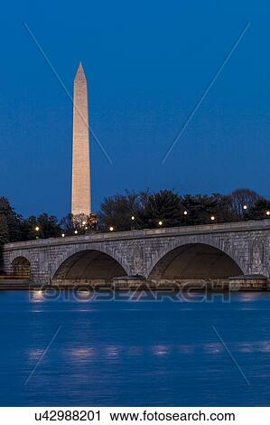 Memorial Bridge at dusk spans Potomac River and features Washington Monument View Large Photo Image Stock Image - Memorial Bridge at dusk spans Potomac River and features Washington Monument. Fotosearch