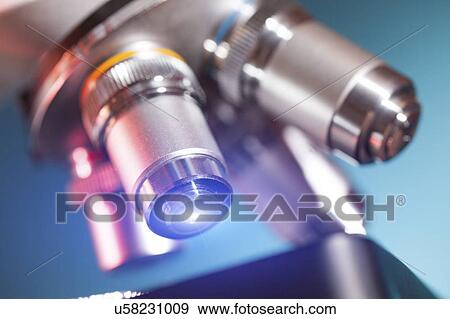 Stock Photo - Microscope stage and lenses.. Fotosearch