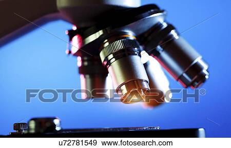 Stock Photo - Microscope stage and lenses.. Fotosearch