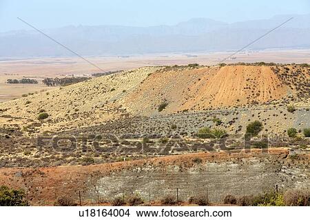 Picture - Mine waste from De Hoek Mine Limestone (owned by PPC Cement), Piketberg, Western Cape, South Africa.. Fotosearch