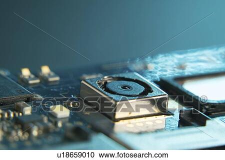 Stock Image - Mobile phone circuit board.. Fotosearch