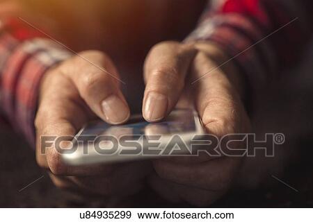 Stock Photo - Mobile phone use.. Fotosearch
