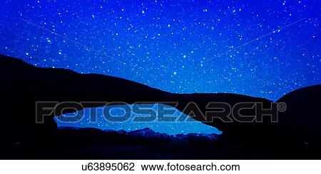 Stock Image - Mobius Arch, Alabama Hills, Lone Pine California. Fotosearch