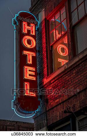 Stock Image - Neon Sign for "Hotel" in Texas. Fotosearch