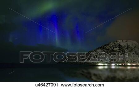 Stock Image - Northern lights, Skagsanden beach, Lofoten Islands, Norway.. Fotosearch