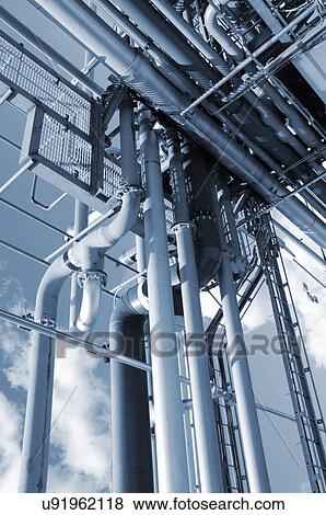 Stock Photo - Onshore pipelines at oil and gas refinery.. Fotosearch