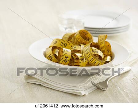 Pasta bowl with tape measure. View Large Photo Image Stock Image - Pasta bowl with tape measure.. Fotosearch