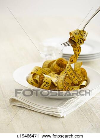 Pasta bowl with tape measure. View Large Photo Image Stock Image - Pasta bowl with tape measure.. Fotosearch
