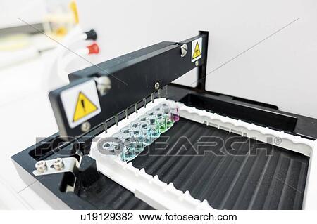 Stock Image - PCR (polymerase chain reaction) machine.. Fotosearch