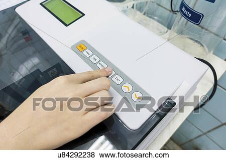 PCR (polymerase chain reaction) machine. View Large Photo Image Stock Photo - PCR (polymerase chain reaction) machine.. Fotosearch