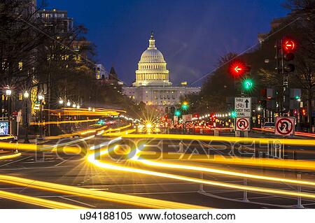 Stock Photography - Pennsylvania Ave to US Capitol with streaked lights going towards US Capitol in Washington DC. during rush hour PM. Fotosearch