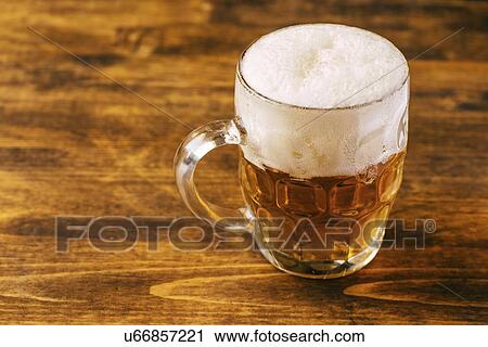 Stock Image - Pint of beer.. Fotosearch