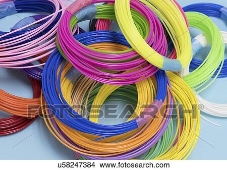 Plastic filaments for 3D printing. View Large Photo Image Picture - Plastic filaments for 3D printing.. Fotosearch