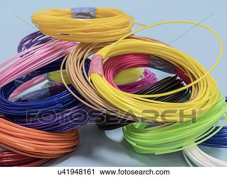 Stock Image - Plastic filaments for 3D printing.. Fotosearch