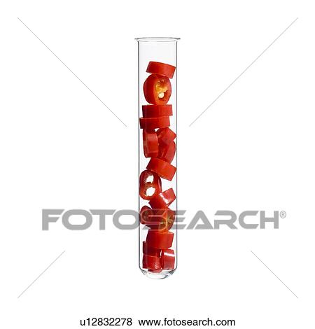 Stock Photo - Red chilli pepper in test tube, studio shot.. Fotosearch