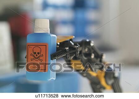Robotic arm holding dangerous chemical. View Large Photo Image Stock Photo - Robotic arm holding dangerous chemical.. Fotosearch