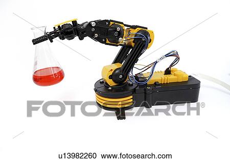 Stock Image - Robotic arm holding flask.. Fotosearch