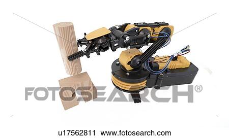 Stock Image - Robotic arm using building blocks.. Fotosearch