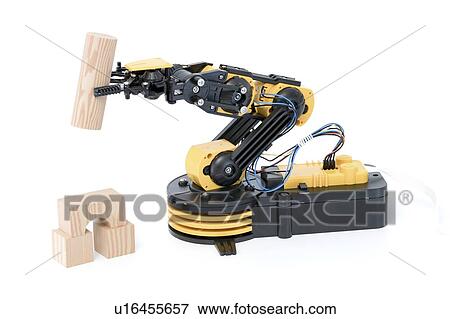 Stock Photo - Robotic arm using building blocks.. Fotosearch