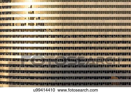 Stock Image - Rosslyn Twin Tower, former USA Today building, Washington D. C. - windows at sunset. Fotosearch