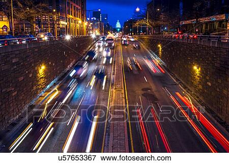 Stock Photo - Rush hour traffic on North Capitol show tail lights leading to US Capitol, Washington D. C. . Fotosearch