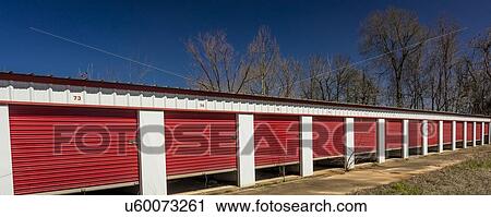 Self storage warehouse with open red doors outside Marshall - Texas Americana View Large Photo Image Stock Image - Self storage warehouse with open red doors outside Marshall - Texas Americana. Fotosearch