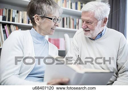 Senior couple reading book. View Large Photo Image Stock Image - Senior couple reading book.. Fotosearch