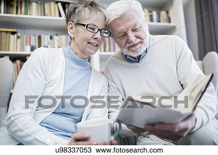 Senior couple reading book. View Large Photo Image Stock Image - Senior couple reading book.. Fotosearch