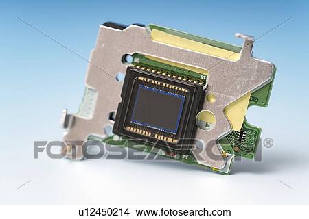 Picture - Silicon charge-coupled device matrix on circuit board.. Fotosearch