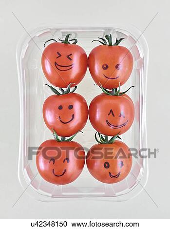 Six tomatoes with eyes and mouths drawn in black ink in plastic container. View Large Photo Image Stock Image - Six tomatoes with eyes and mouths drawn in black ink in plastic container.. Fotosearch