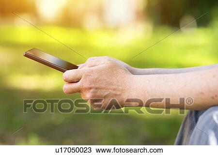 Smartphone use. View Large Photo Image Stock Image - Smartphone use.. Fotosearch