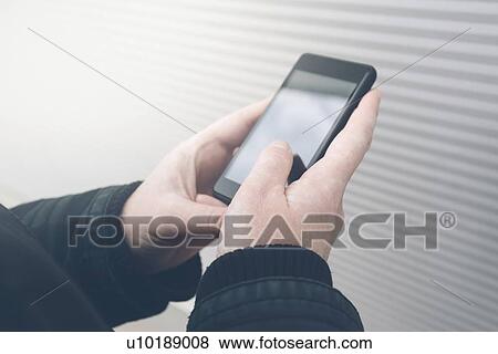 Smartphone use. View Large Photo Image Stock Photo - Smartphone use.. Fotosearch