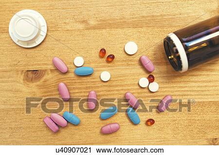 Spilled pills. View Large Photo Image Stock Image - Spilled pills.. Fotosearch