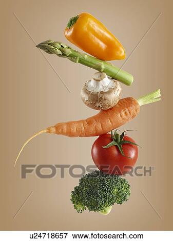 Stack of fresh vegetables. View Large Photo Image Stock Photo - Stack of fresh vegetables.. Fotosearch