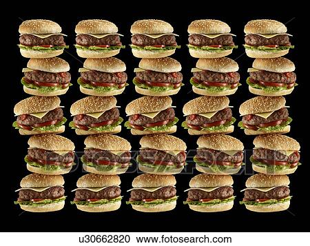 Stock Image - Stacks of hamburgers.. Fotosearch