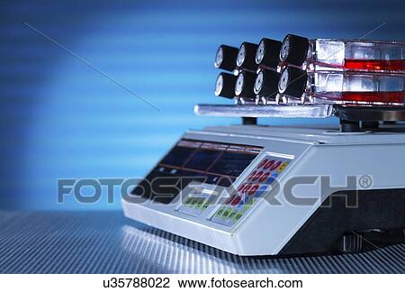 Stock Image - Stem cell cultures on shaker.. Fotosearch